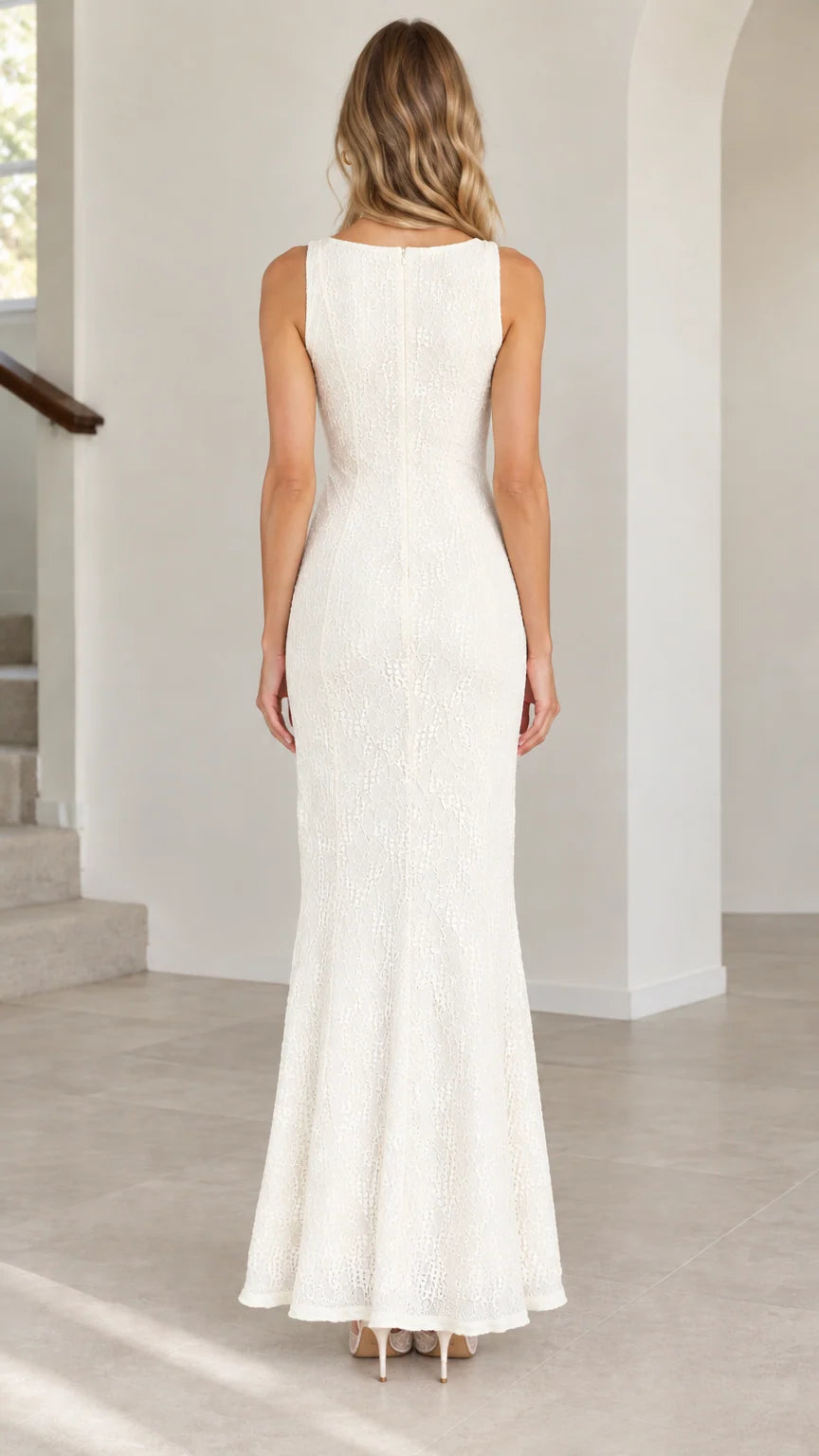 Back view of model wearing floor-length ivory lace evening dress