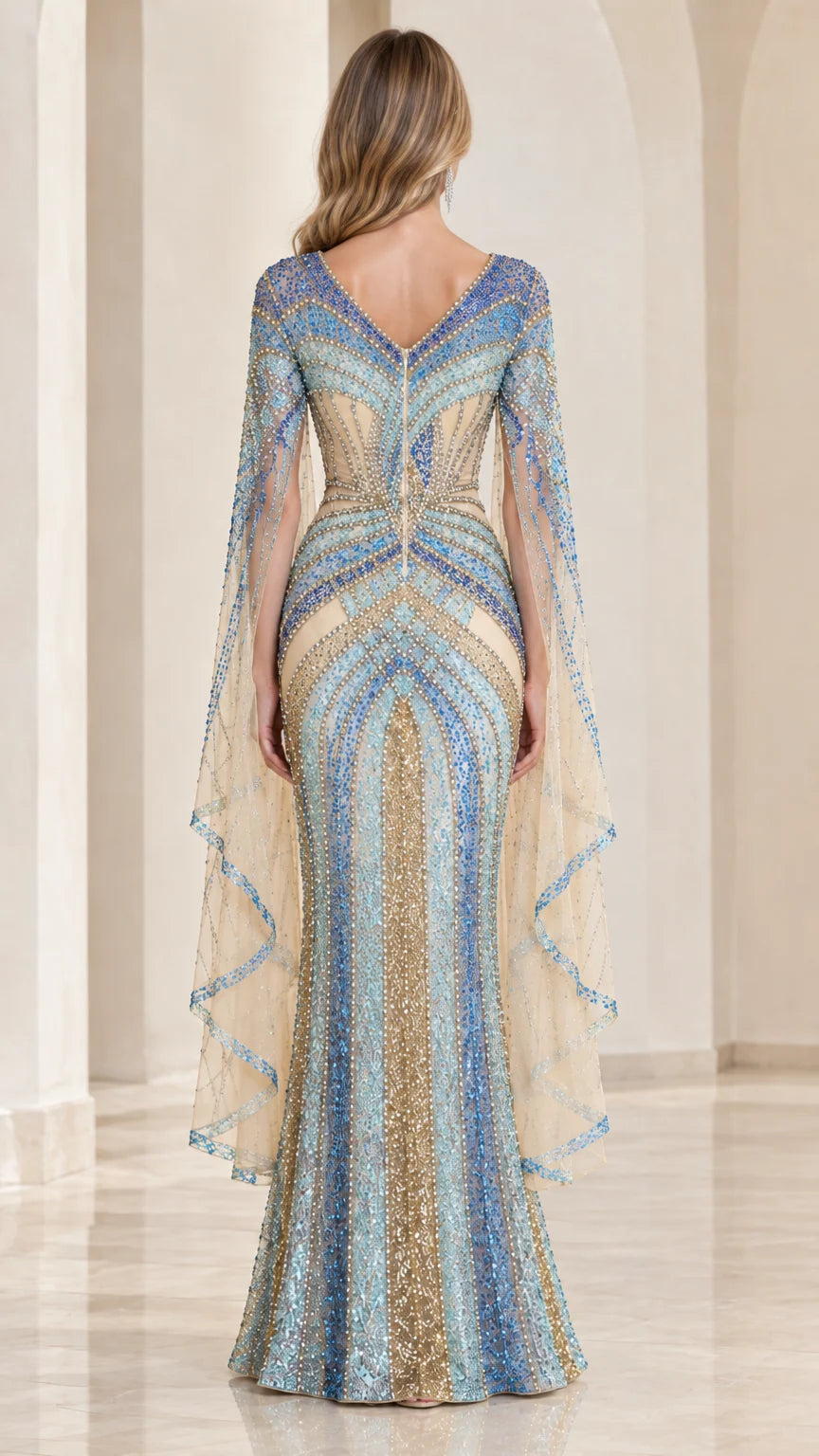 Back view of model in Sky Blue cape evening gown with V-back detail