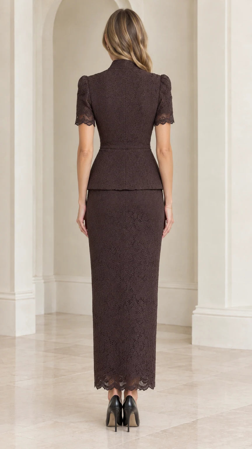 Back view of tailored espresso brown lace peplum top and column maxi skirt