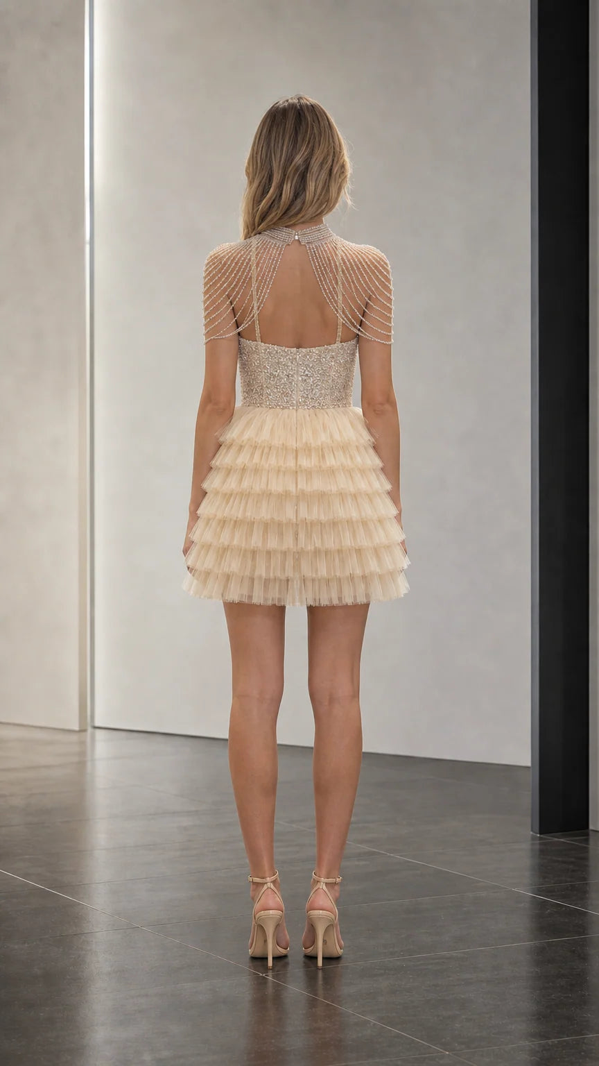 Back view showcasing keyhole back and beaded shoulder detail