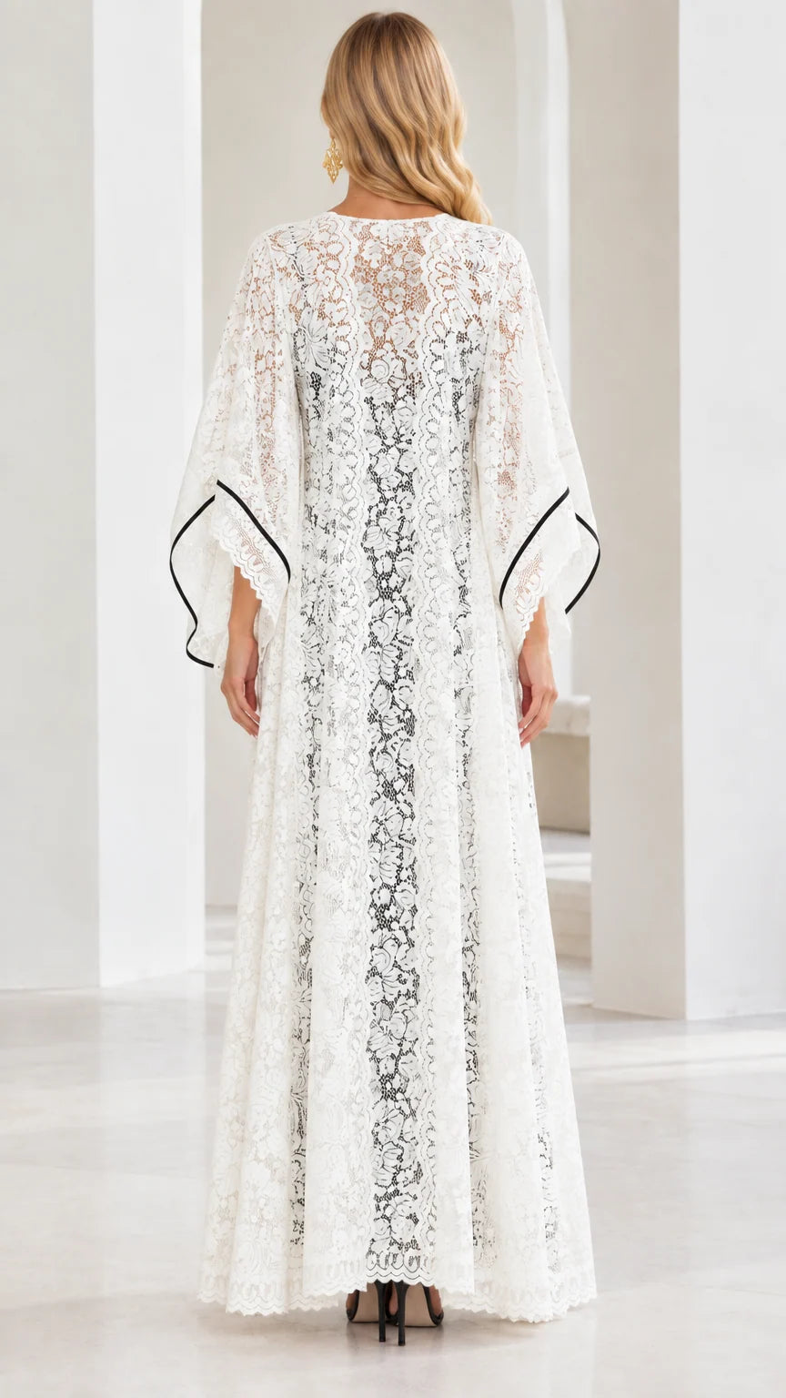 Back view of flowing white sheer floral lace maxi cardigan