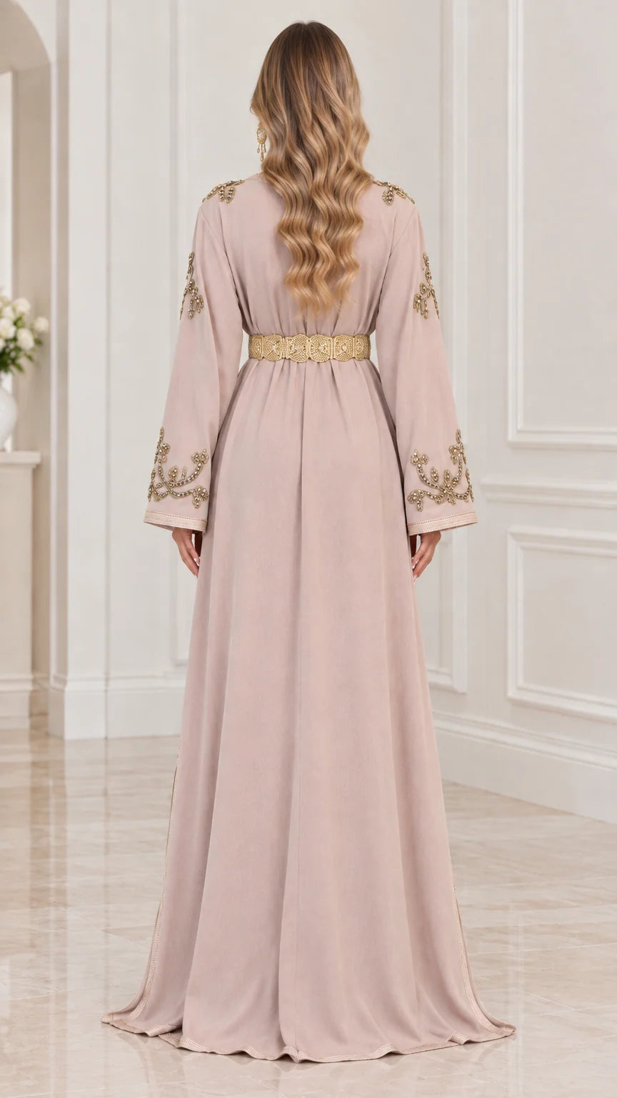 Back view of woman wearing Dusty Pink floor-length embroidered kaftan gown