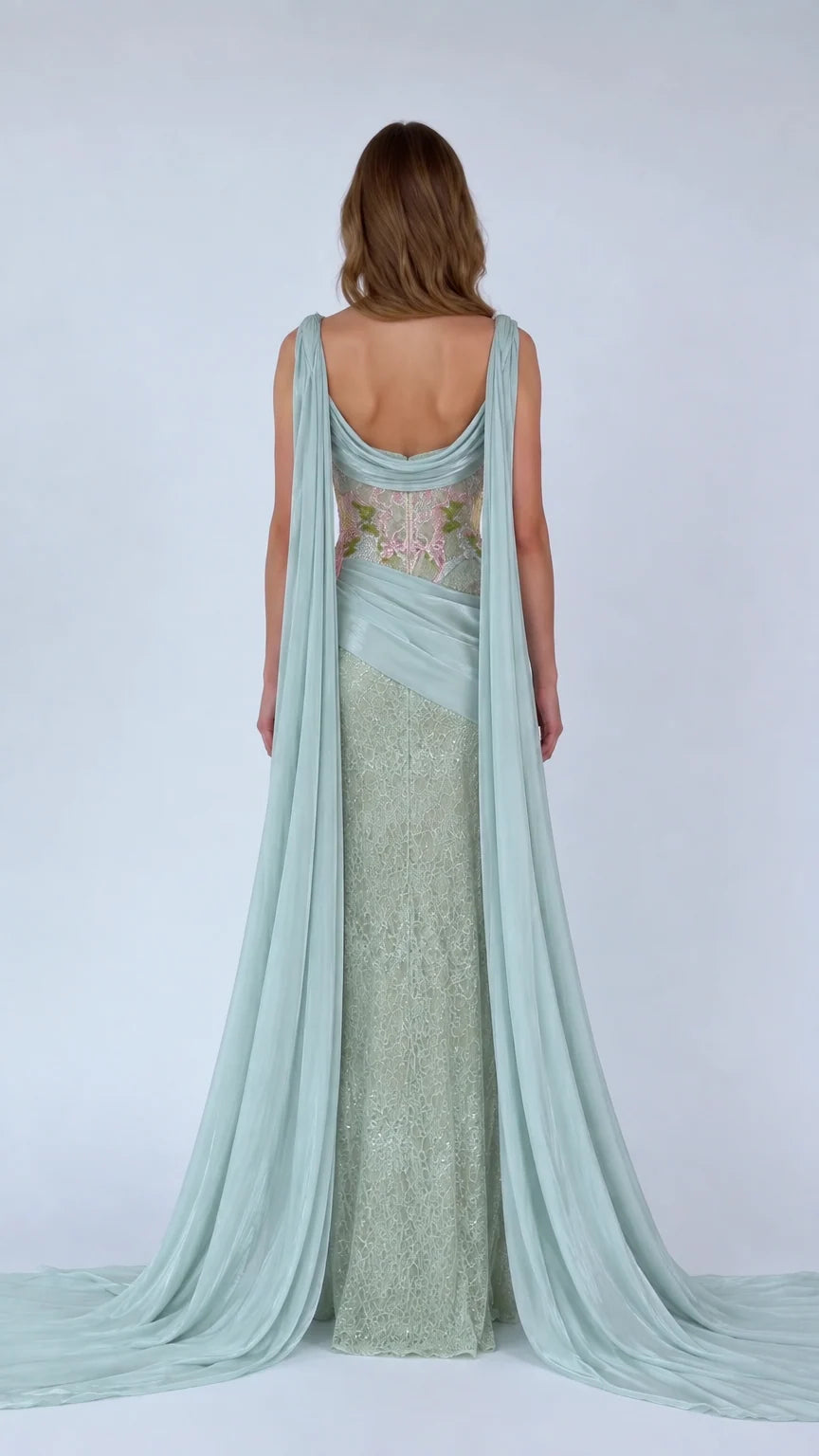 Back view of Sage Green formal dress showing draped open back and floor-length train