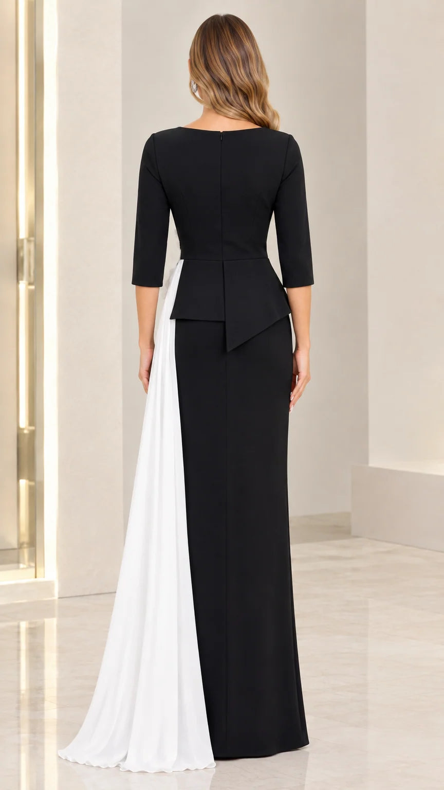 Back view of black formal evening gown with asymmetrical peplum detail and contrast white train