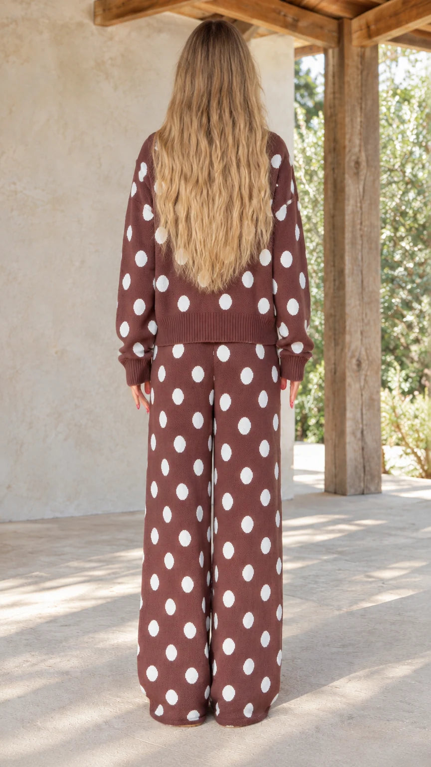 Back view of model wearing brown polka dot wide-leg knit lounge set