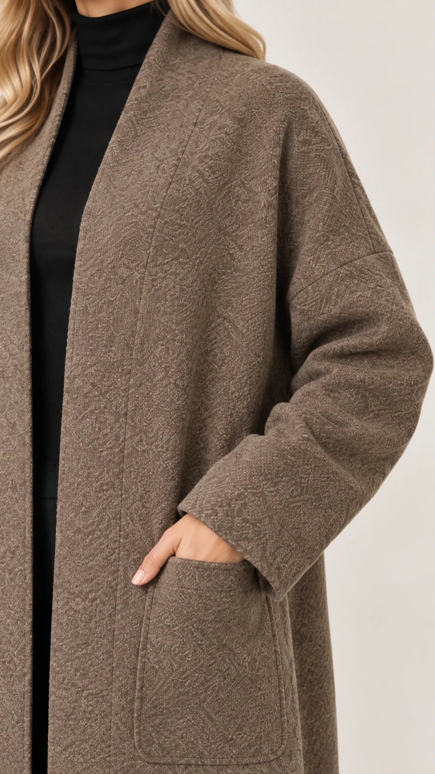 Close-up detail of textured fabric and pocket on mocha coatigan