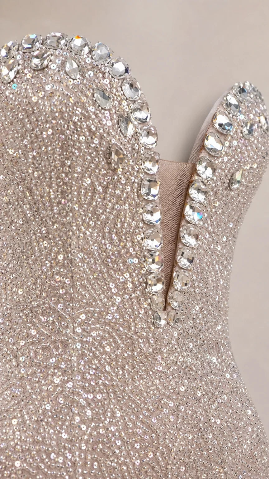 Close-up of crystal embellished plunging neckline