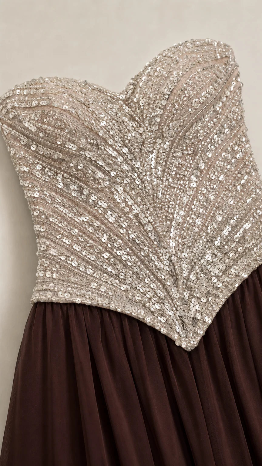 Close-up detail of silver sequin chevron pattern on sweetheart basque bodice