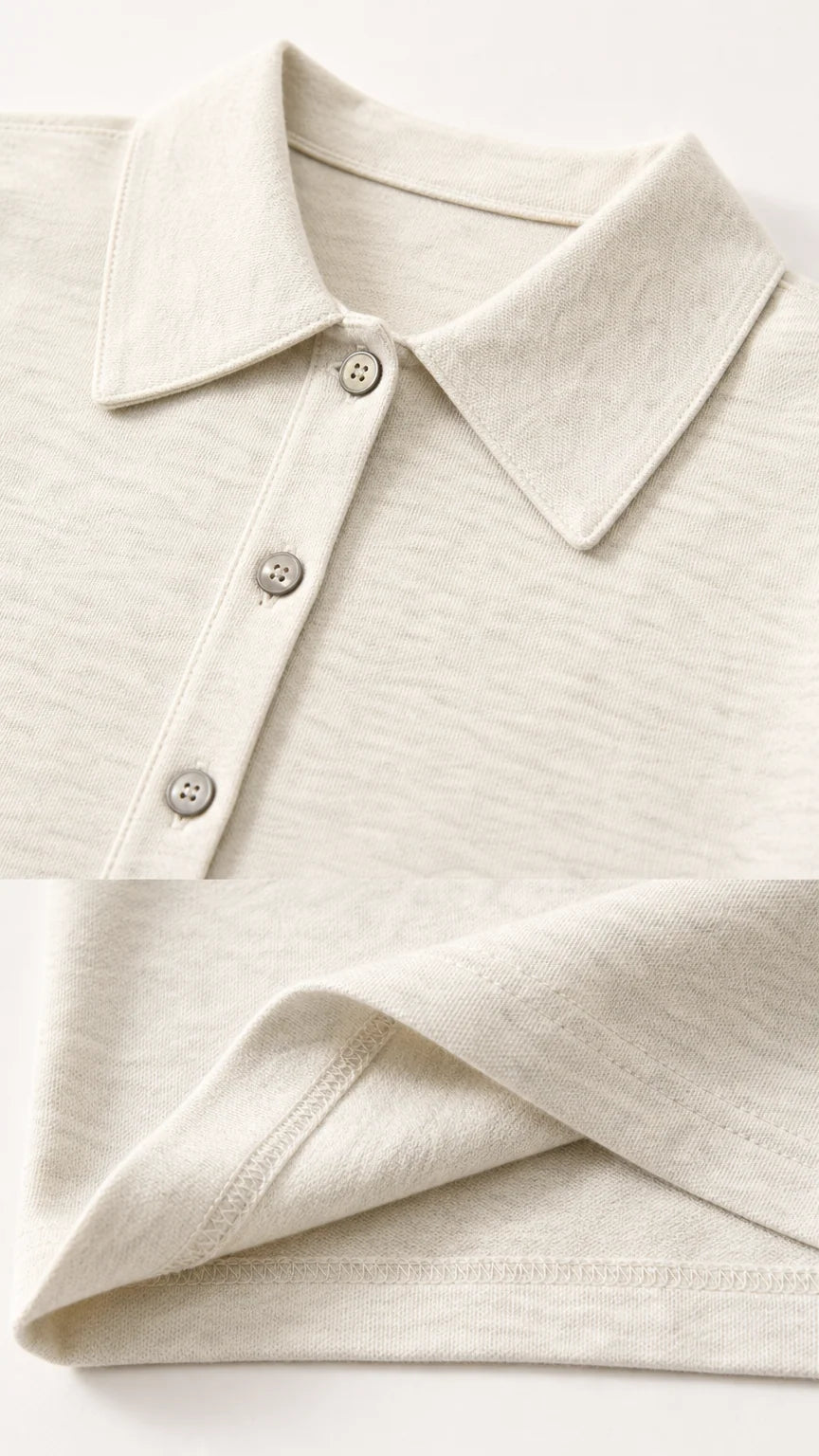 Close-up detail of polo collar buttons and knit fabric texture