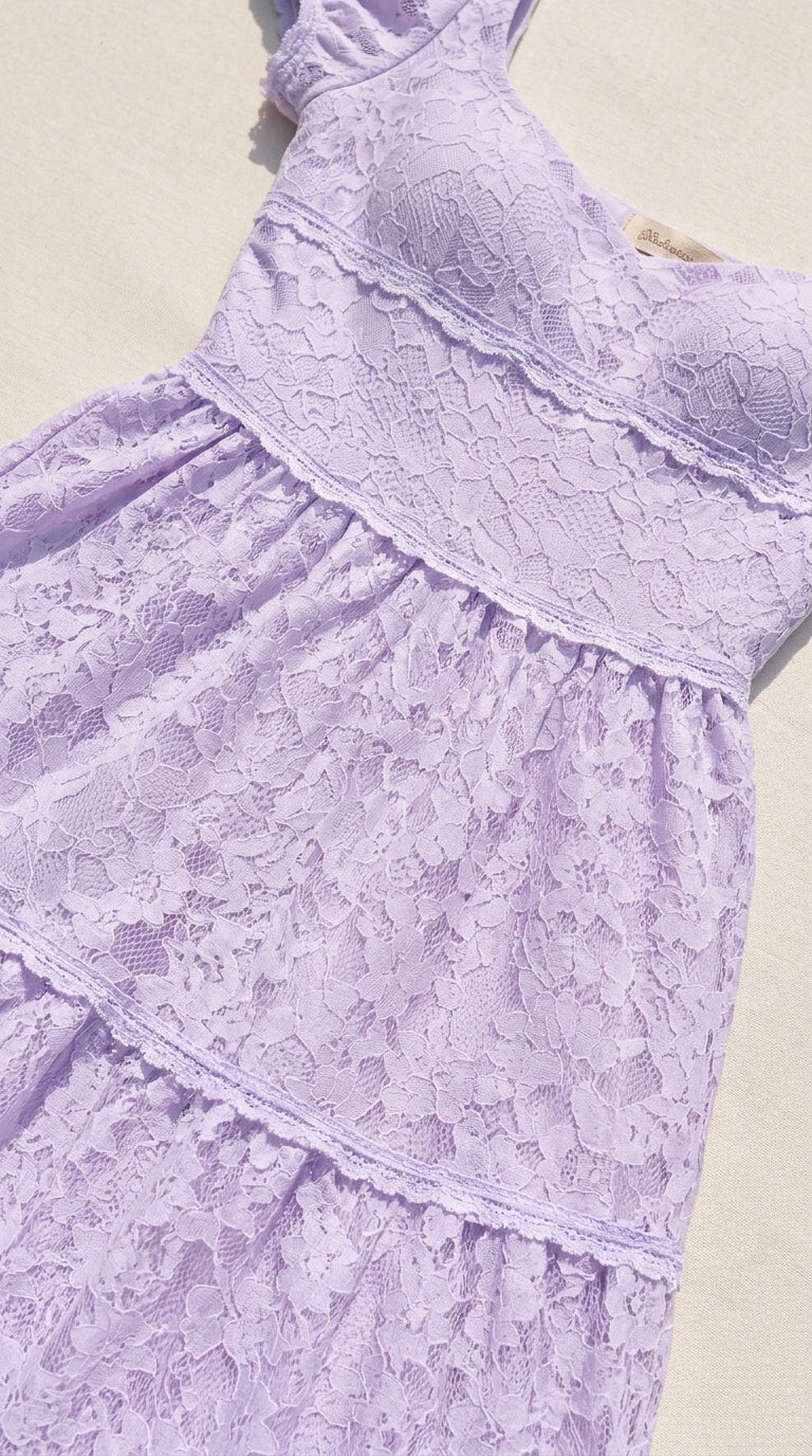 Close up detail of lavender floral lace texture and bust seams