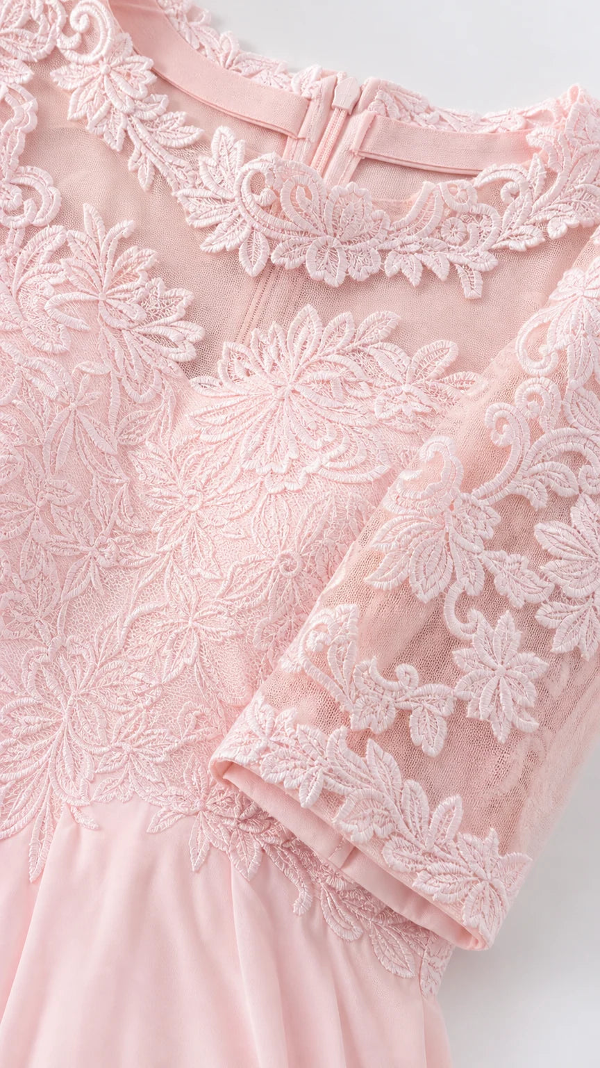 Close-up detail of lace bodice and sleeves