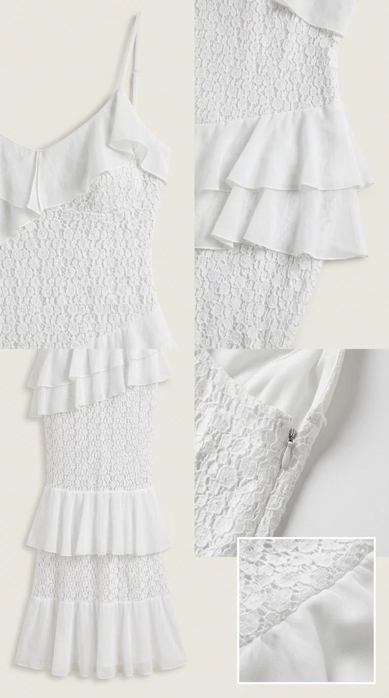 Detailed flat lay of white lace dress fabric, ruffles, and zipper closure