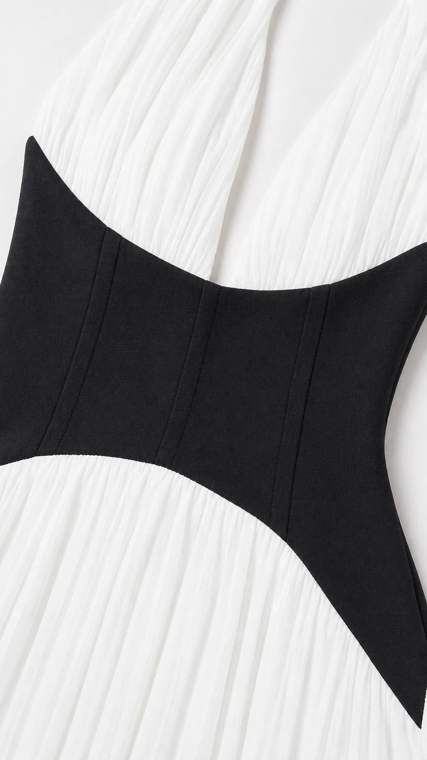 Close-up detail of contrast corset waist on dress