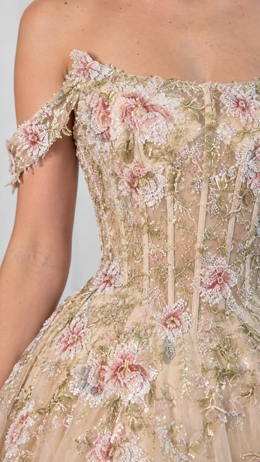 Close-up detail of embroidered corset bodice and off-shoulder straps