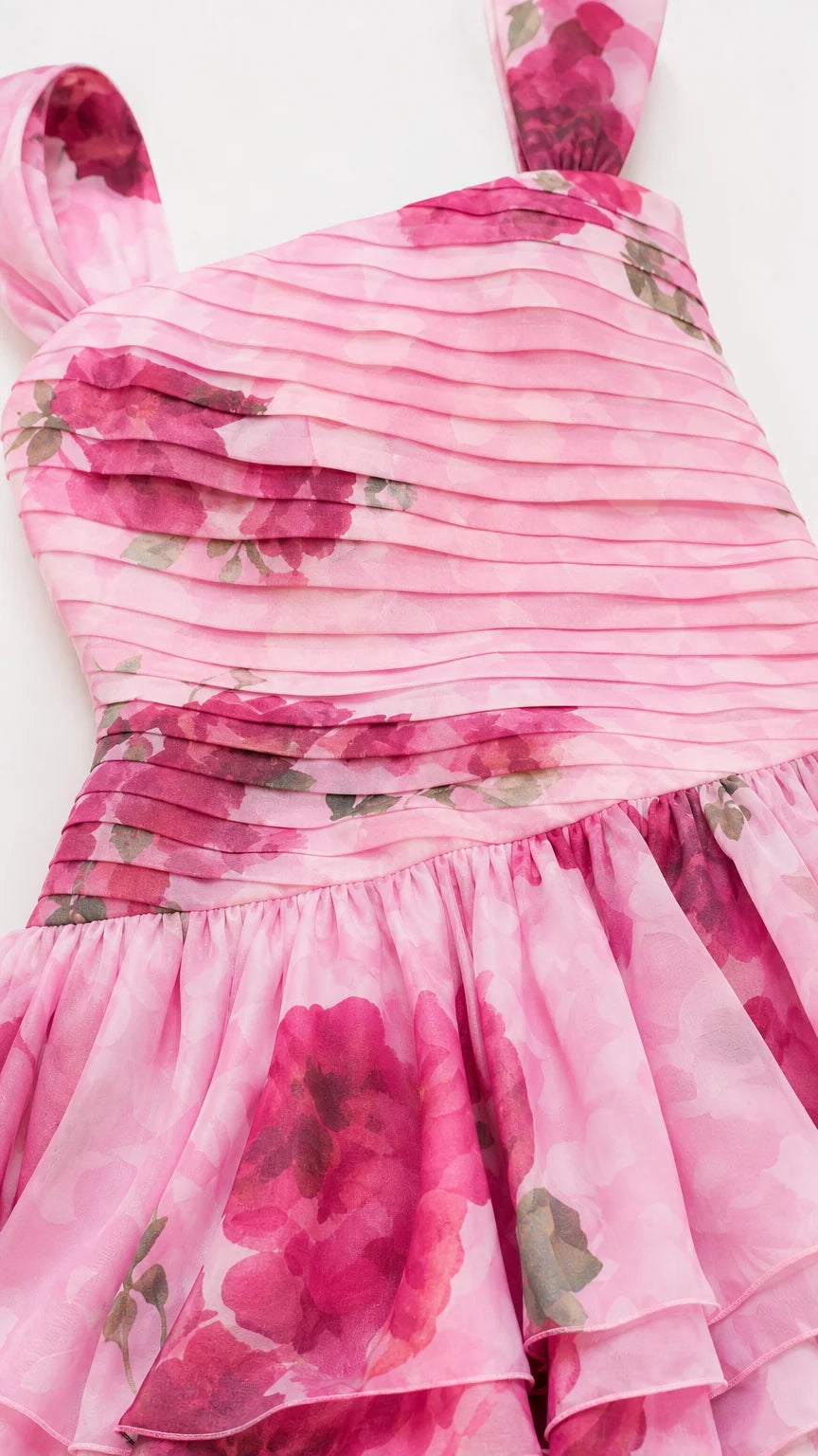 Close-up detail of pleated bodice and floral fabric