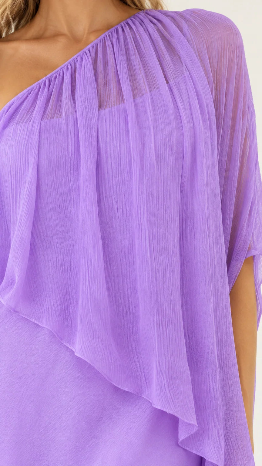 Close-up detail of pleated sheer lavender chiffon cape shoulder