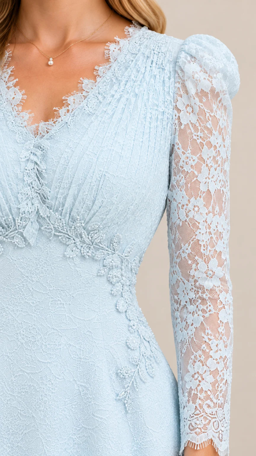 Close-up of Light Blue scalloped lace V-neck bodice and sheer sleeve