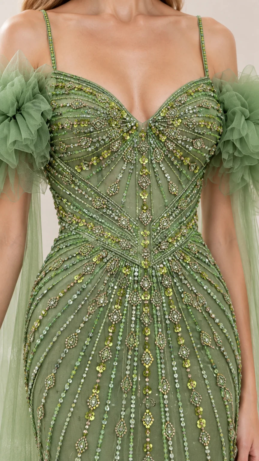 Close-up detail of intricate beadwork and sweetheart neckline on sage green gown