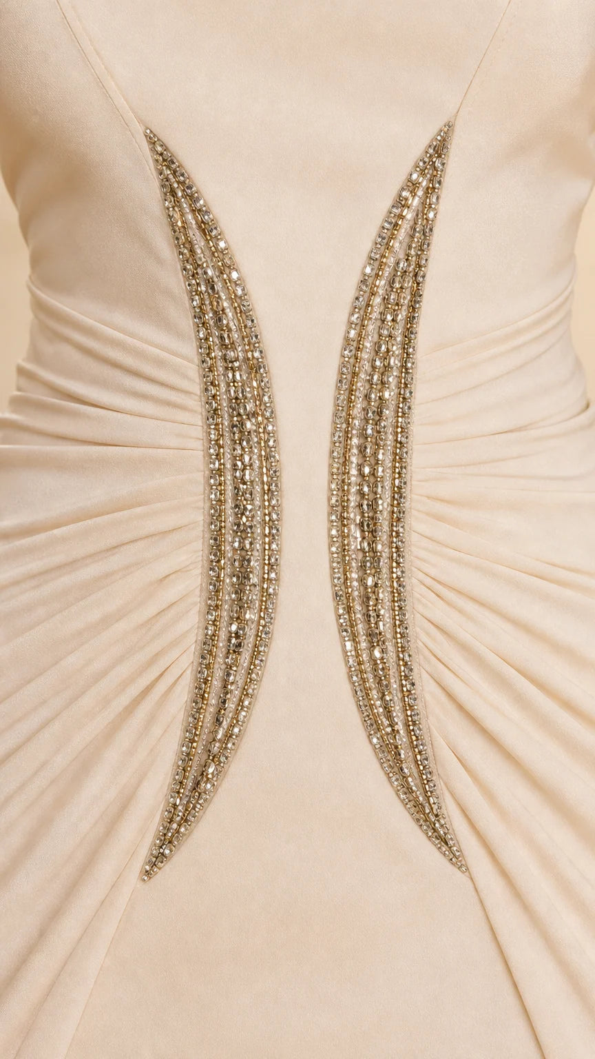 Close-up detail of crystal embellishment and ruching at the waist