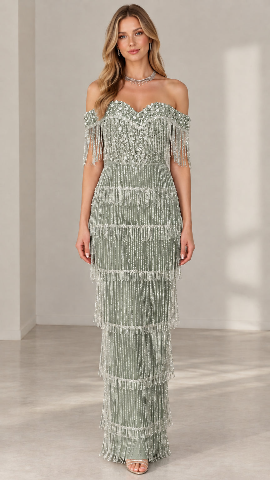 Model wearing sage green off-the-shoulder beaded tassel formal maxi dress