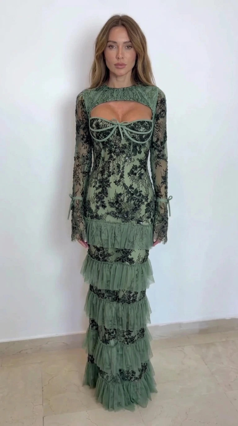 Model wearing sage green floral lace tiered maxi evening dress
