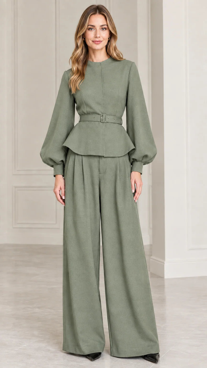 Full-length studio shot of model wearing Sage Green belted peplum top and wide-leg pants set