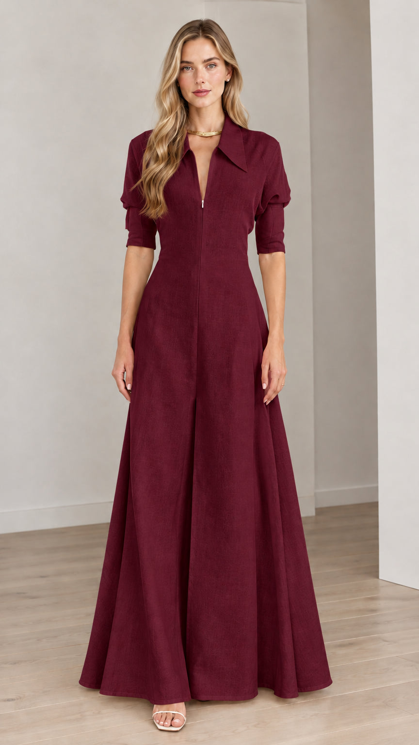 Front view of model wearing a Burgundy collared wide-leg maxi jumpsuit