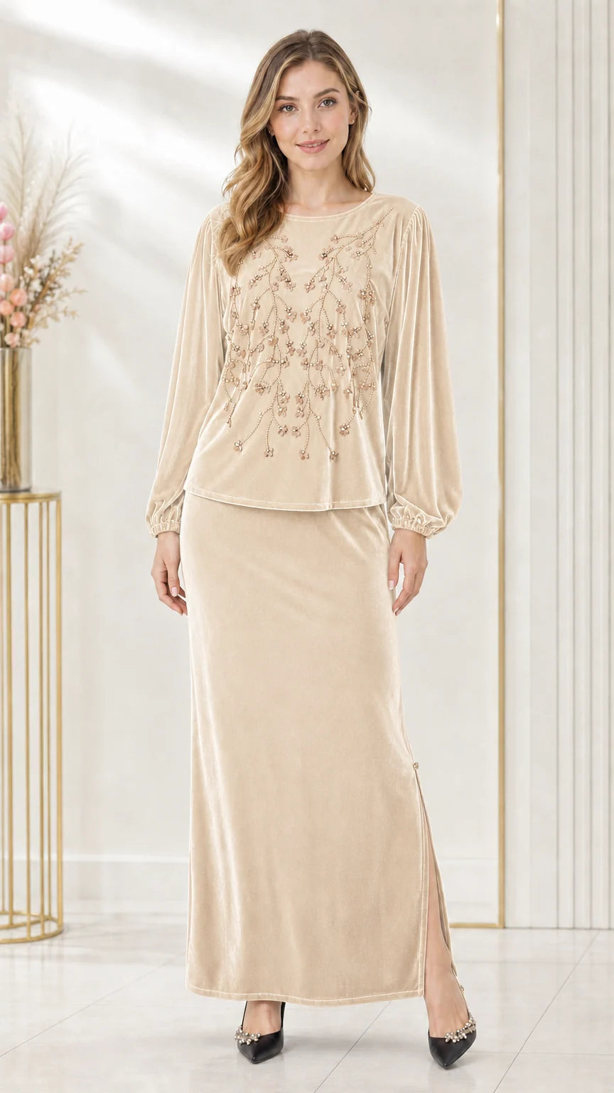 Full-length front view of champagne beige beaded velvet two-piece maxi skirt set