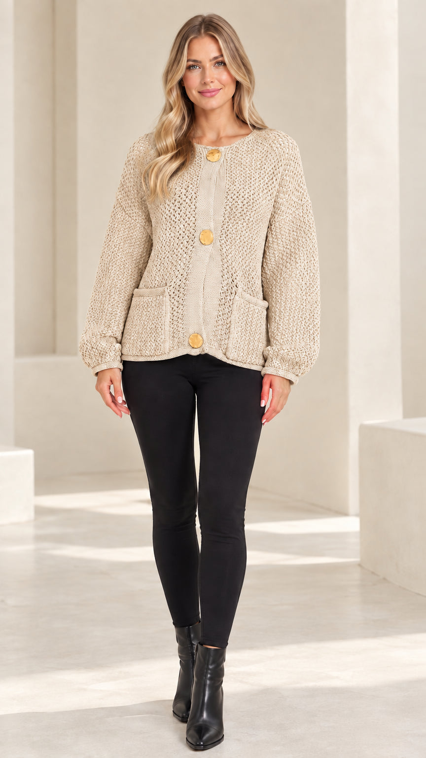 Full-length front view of beige oatmeal textured chunky knit cardigan sweater